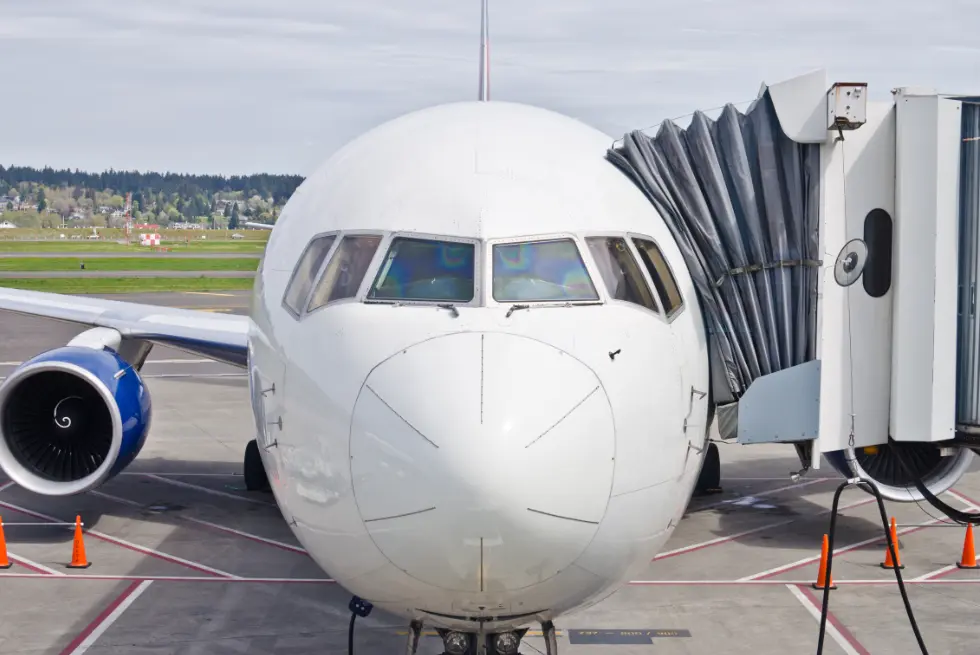 A commercial airliner at the gate