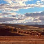 Rolling hills under a cloudy sky